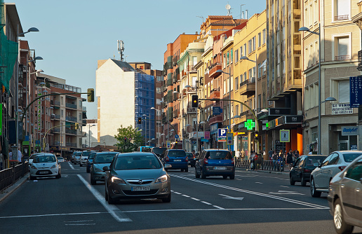 Madrid, Spain - May 18, 2012: Bravo Maria a long avenue across the city with commercial shops and homes usually with very heavy traffic of cars. 