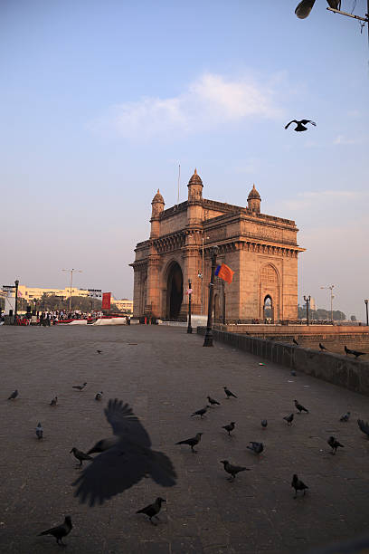 MUMBAI, INDIA - July 09, 2017 - Unidentified people walking  around the Gateway of India