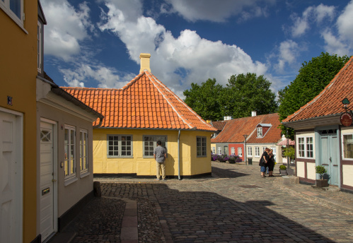 Odense, Denmark - July 31, 2013: People walking the cosy streets around the house of Hans Christien Anderson in Odense