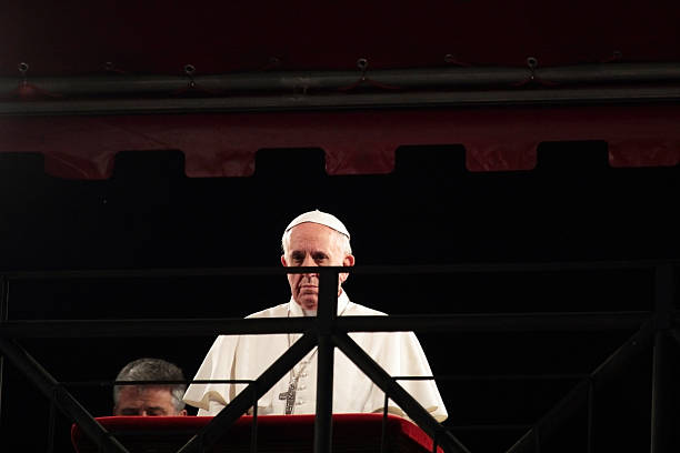 Rome, Italy - March 29, 2013: The Pope Francis I is chairing the Stations of the Cross on Good Friday under the canopy set up in Colosseum Square.