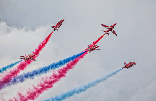 Red Arrows Cleethorpes, England - July 28, 2013: Royal Air Force aerobatic display team The Red Arrows put on a display at the Cleethorpes airshow. british aerospace stock pictures, royalty-free photos & images