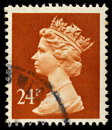 Exeter, United Kingdom - February 1, 2010: An English One Pound and Fifty Pence Used Postage Stamp showing Portrait of Queen Elizabeth 2nd, printed and issued between 1977 and 1987