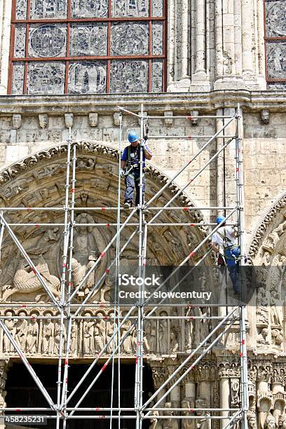 Workers At Reconstruction Of Chartres Cathedral Stock Photo - Download Image Now - Clambering, France, Ancient