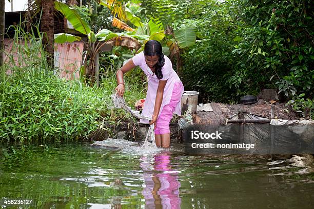 Woman Washing Clothes Stock Photo - Download Image Now - Clothing, Laundry, One Woman Only