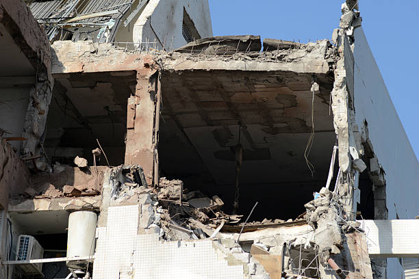 Damaged house - hit by rocket stock photo