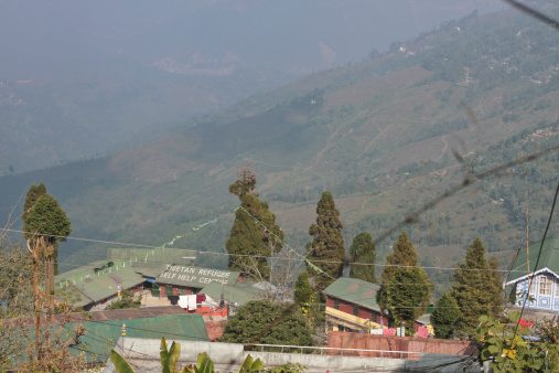 Darjeeling, India - December 13, 2010: The panorama view over the tea plantations and the tibetean refugee self help centre.