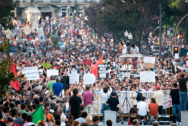 Protest against government spending cuts and tax rises Porto, Portugal - September 15, 2012: People protesting against government spending cuts and tax rises in Aliados square, Porto on September 15, 2012. banner allied forces placard protestor stock pictures, royalty-free photos & images