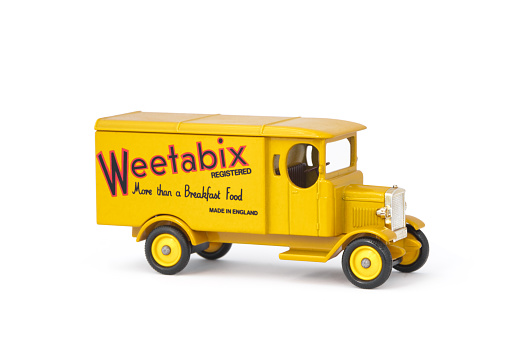 Yateley, Hampshire, UK - February 19, 2013:  Vintage 1931 Morris delivery van manufactured by Lledo replica model makers. The vehicle livery is for Weetabix breakfast cereals.