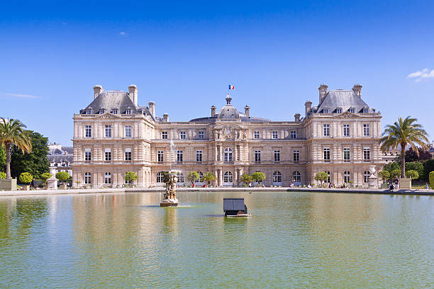 Palais du Luxembourg, Paris. Paris, France - June 30, 2012: Palais du Luxembourg. The Palais is situated in the Jardin du Luxembourg (Luxembourg Garden) in the Latin Quarter.  The palace was built between 1615 and 1627 for Marie de' Medici. The building currently houses the French Senate. The Jardin du Luxembourg is probably the most popular park in Paris. Tourists are walking around the garden. luxembourg paris stock pictures, royalty-free photos & images