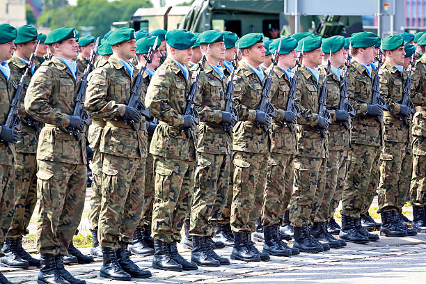Polish Heroes Szczecin, Poland - June 27, 2013: Soldiers of Polish army on farewell military parade  waiting for order to leaving to Afghanistan, Szczecin, Poland nato stock pictures, royalty-free photos & images
