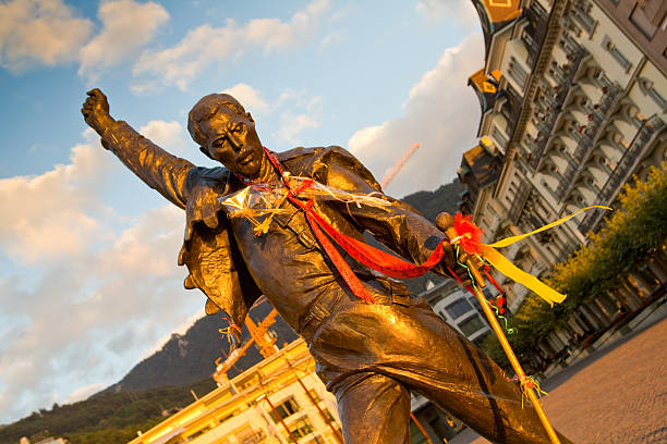 Freddie Mercury statue Montreux, Switzerland  - September 19, 2012: A statue in Montreux, Switzerland (by sculptor Irena Sedlecka) was erected as a tribute to Mercury. It stands almost 10 feet (3 metres) high overlooking Lake Geneva and was unveiled on 25 November 1996. Beginning in 2003, fans from around the world gather in Switzerland annually to pay tribute to the singer as part of the "Freddie Mercury Montreux Memorial Day" on the first weekend of September. montreux photos stock pictures, royalty-free photos & images