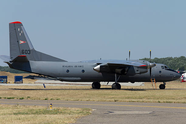 Antonov An-26 KecskemAt, Hungary - August 3, 2013: Hungarian Antonov An-26 at the KecskemAt Military Airport on a summer afternoon. antonov an 26 stock pictures, royalty-free photos & images
