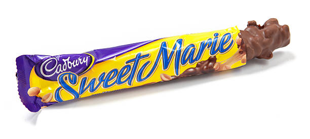Sweet Marie Chocolate Candy Bar Unwrapped Toronto, Canada - May 10, 2012: This is a studio shot of a Sweet Marie chocolate candy bar made by Cadbury isolated on a white background. cadbury plc photos stock pictures, royalty-free photos & images