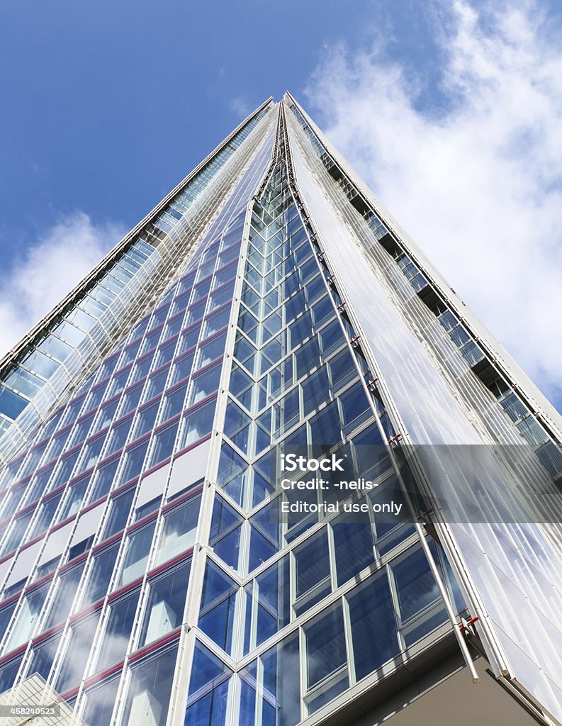 The Shard London, United Kingdom - July 20, 2013: The Shard, London Bridge skyscraper designed by Renzo Piano, shot from bottom to top on a bright, sunny day. Alley Stock Photo