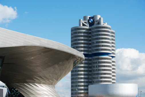 Munich, Germany - November 5, 2013: BMW Tower in Munichwhere the BMW Group is headquartered. The architect was Karl Schwanzer from Vienna and it was constructed in 1972. The building in front is the BMW Welt an event forum, showroom and conference center. It was opened in 2007. The museum on the right was established in 1972 and revitalized in 2008.