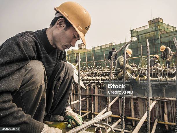 Foto de Edifício Da Cidade e mais fotos de stock de Trabalhador migrante - Trabalhador migrante, Ásia, Adulto