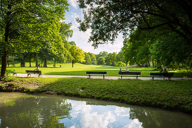 Munich, Germany - August 5, 2013: People relax and meander about the Englischer Garten, German for \