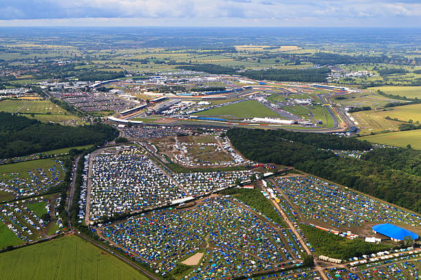 Silverstone Circuit Silverstone, UK - July 7, 2012: Aerial view of full campsites and adjacent Silverstone Circuit during Formula 1 Grand Prix period. silverstone stock pictures, royalty-free photos & images