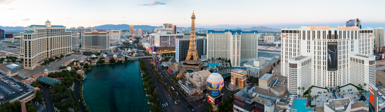 Las Vegas, Nevada, USA - September 3, 2012: Panoramic view of famous Las Vegas Strip at sunset.  High angle view towards the north end of the strip: Bellagio, Caesars Palace, Paris, Planet Hollywood, Treasure Island, Venitian, Mirage, Palazzo, Wynn and many other luxury casino resorts in the heart of Las Vegas.
