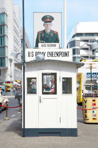 Berlin, Germany - July 31st, 2012: Checkpoint Charlie in Berlin was the crossing point Between East and West Berlin sectors during the Cold War.