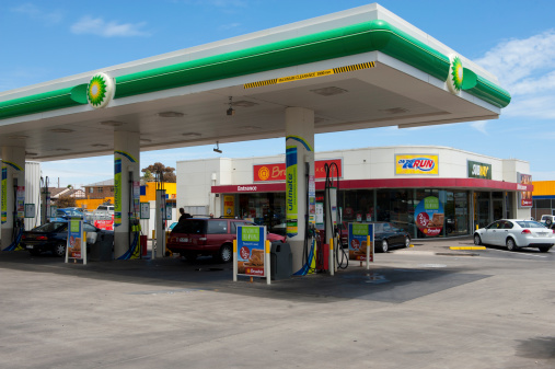 Adelaide, Australia - November 19, 2013: An On The Run Service Station in Christies Beach, South Australia. Operated by the Peregrine Corporation these outlets have transformed the service station industry in South australia. Combining traditional petrol station services such as petrol supply and car washes with food outlets such as subway and hungry jacks making them more like a convenience store.