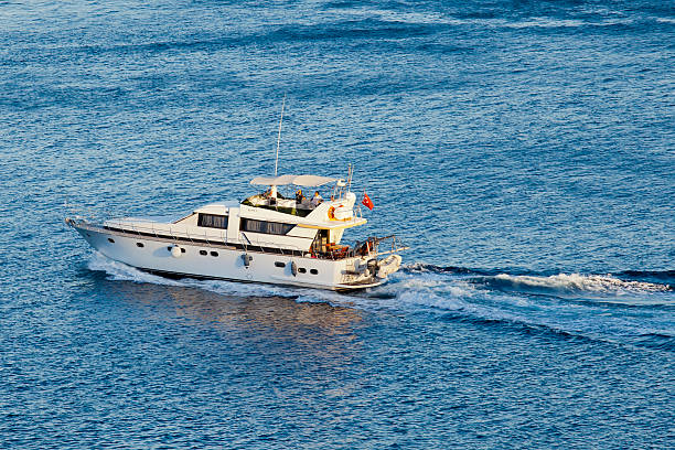 police boat going on the sea and wave behind it, police boat on bosphorus, police chasing criminal at sea, white wave.