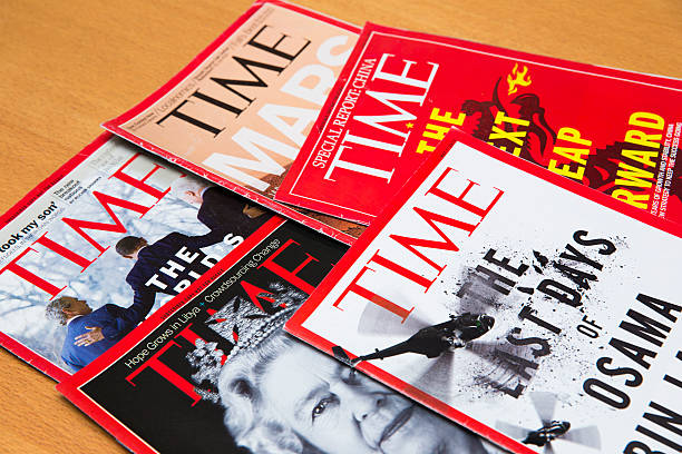 Time Magazine Shanghai, China - Oct 2, 2013: Time magazine displayed. Time is America's most popular magazine which introduces news to the public on a weekly basis. newspaper seller stock pictures, royalty-free photos & images