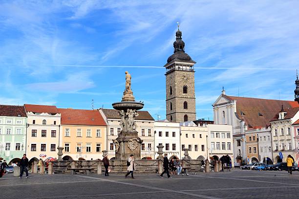 Town Square in the centre of Ceske Budejovice Ceske Budejovice, Czech Republic - November 3, 2012: Fountain and Town Square in the centre of Historic Ceske Budejovice. The town where the original "Budweiser" beer originates from. People can be seen around the fountain. cesky budejovice stock pictures, royalty-free photos & images