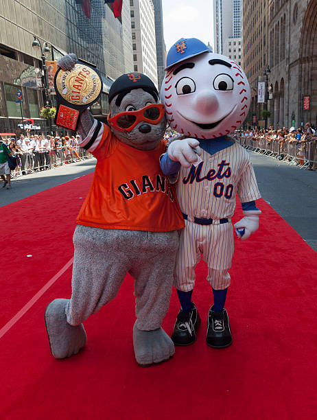 All-star game red carpet New York, USA - July 16, 2013: New York Mets mascot Mr. Mets & San Francisco Giants Lou Seal pose on red carpet during the MLB All-Star Game Red Carpet Show along 42nd street on July 16, 2013 in New York major league baseball stock pictures, royalty-free photos & images