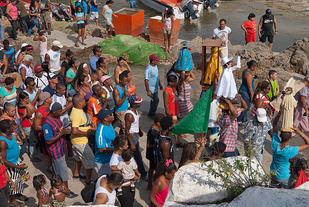 Ocumare de la Costa de Oro, Venezuela- July 16, 2013: Religious Fiesta in South America at Ocumare de la Costa de Oro. Group of people from children to adults walking,dancing,singing and playing musical instruments as \