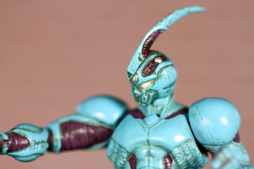 Vancouver, Canada - January 22, 2013: A model of The Guyver Suit posed on a brick background. The Guyver suit is a living mechanism that bonds with a host, transforming the host into a powerful weapon. The Guyver suit is from the Manga of the same name, as well a series of animated and live action movies.