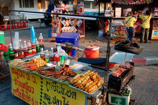 Chiang Mai, Thailand - March 16, 2008: Sunday street market in Chiang Mai. local skewers barbecue sellers in the popular sunday venue.