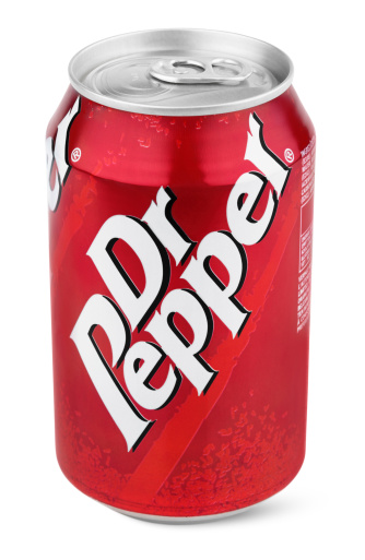 Tula, Russia - January 21, 2013: Closeup of aluminum red can of Dr Pepper isolated on white background with clipping path. Dr. Pepper is now manufactured by the Dr Pepper Snapple Group, Inc.