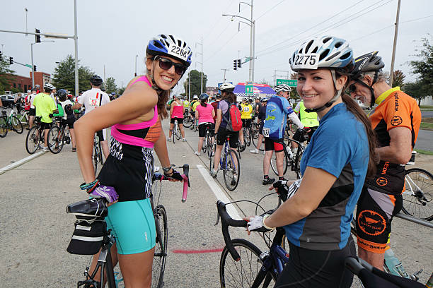 Cyclists anticipating the start of a fundraising bicycle ride stock photo