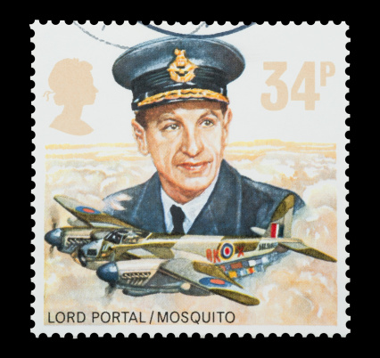 Yateley, Hampshire, UK - September 14, 2012: Mail stamp printed in the UK commemorating the WW2 Mosquito fighter aircraft and RAF leadership of Lord Portal, circa 1986