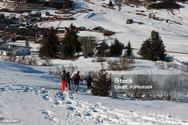 Seiser Alm Group Of People With Snowshoes Stock Photo - Download Image Now