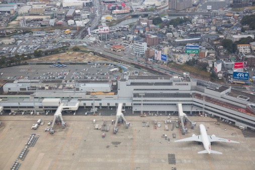 Fukuoka, Japan - March 14, 2013 : High angle view of Fukuoka Airport in Japan. It is the fourth busiest passenger airport in Japan. Fukuoka Airport is located in city area in Fukuoka. It is directly connected to the subway providing immediate access to Hakata Station only 5 minutes.