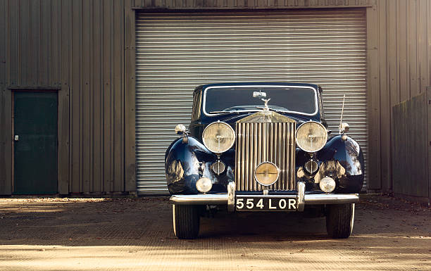 Rolls-Royce Silver Wraith London, England, UK- November 11, 2012: Vintage Rolls-Royce Silver Wraith parked in front of a garage door rolls royce stock pictures, royalty-free photos & images