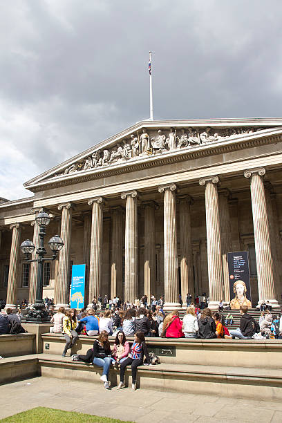 Tourists at the British Museum London, UK - July 23, 2011: Visitors at the entrance of the British Museum in London, UK on July 23, 2011. british museum stock pictures, royalty-free photos & images