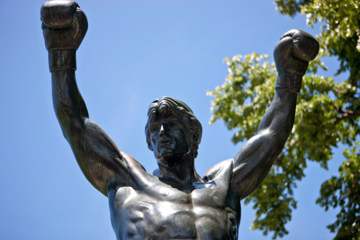 Philadelphia, USA  - May 20, 2012: Rocky Balboa Statue in Philadelphia, statue of the fictional rocky Balboa played by Sylvester Stallone in Rocky movies in 1980. Sylvester Stallone donated the bronze monument to the City of Philadelphia.