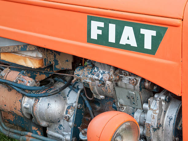 Saonara, Italy - August 15, 2012: Part of an old Fiat (model 411) agricultural tractor engine. Fiat Trattori S.p.A. a part of the Fiat group, tha automobile manufacturer, was an agricultural equipments producer since 1919. Shot during an exhibition of agricultural machinery in a country festival in Saonara, Padua province, Italy.