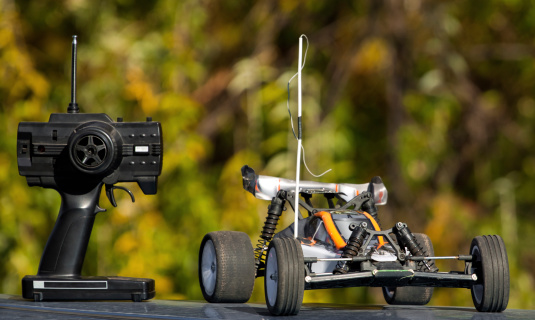 Subotica, Serbia - October 29, 2011: In the picture you can see the small remote control car , prior to the race, on the way. The picture was in Subotica, Serbia meadow near the forest.