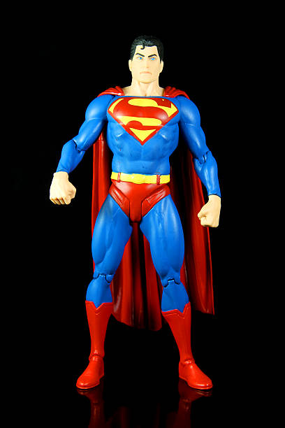 Steel and Black Vancouver, Canada - October 4, 2012: Action figure models of Superman and Batman, released by DC comics, against a black background. superman named work stock pictures, royalty-free photos & images