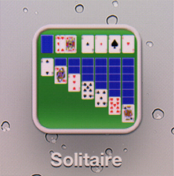 Orphaned Kyiv, Ukraine - September 7, 2012: Close-up of the Solitare application icon on the screen of the "The new Ipad". leisure games apps solitaire computer stock pictures, royalty-free photos & images