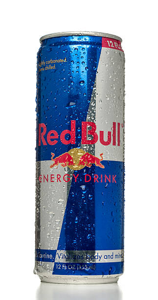 Miami, USA - November 02, 2013: Red Bull energy drink 12 FL OZ can. Red Bull brand is owned by Red Bull GmbH.