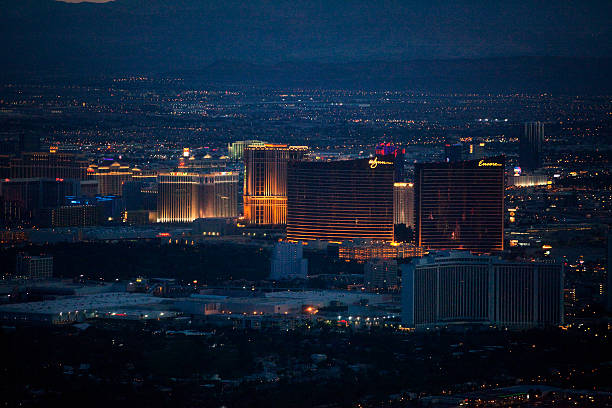 Aerial Shot of Wynn/Encore Hotel and Casino Nighttime Las Vegas, Nevada, United States - May 15, 2012. Aerial shot of the Wynn and Encore hotel and casino on the Las Vegas Strip at nighttime. The Las Vegas Strip is home to most of the world's largest hotels and casinos. wynn las vegas stock pictures, royalty-free photos & images