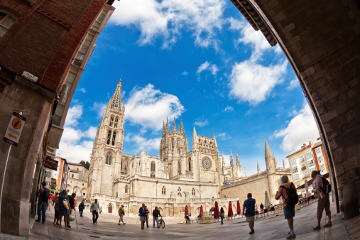 San Sebastian, Spain - September 12, 2012: Fisheye view of Burgos Cathedral (Spanish: Catedral de Burgos), Gothic-style Roman Catholic cathedral in Burgos, Spain, dedicated to the Virgin Mary. The cathedral is famous for its enormous size and unique architecture.