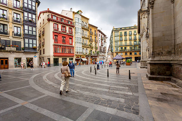 Bilbao's Casco Viejo Bilbao, Spain - September 5, 2012: People walking during the day on one of the squares of the pedestrian zone in Bilbao's Casco Viejo (Old Town), a conservation area which is the historical heart of Bilbao. Casco stock pictures, royalty-free photos & images