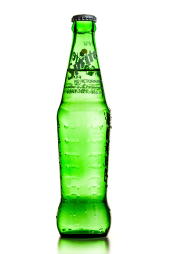 Miami, Florida - July 10, 2013: Sprite bottle on white background. Sprite is a product of Coca Cola Company.