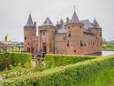 Muiden, Netherlands - May 19, 2013: Visitors at Muiderslot on Dutch National Castle Day, held at Muiderslot Castle in Muiden, Netherlands on May 19, 2013